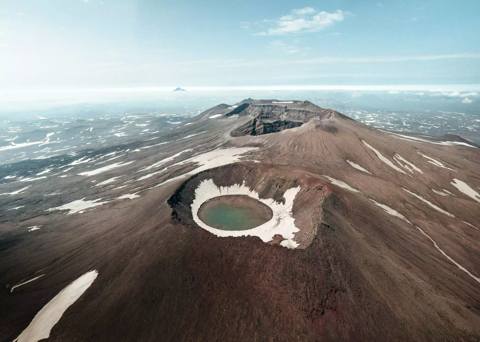gorely volcano with water on crater