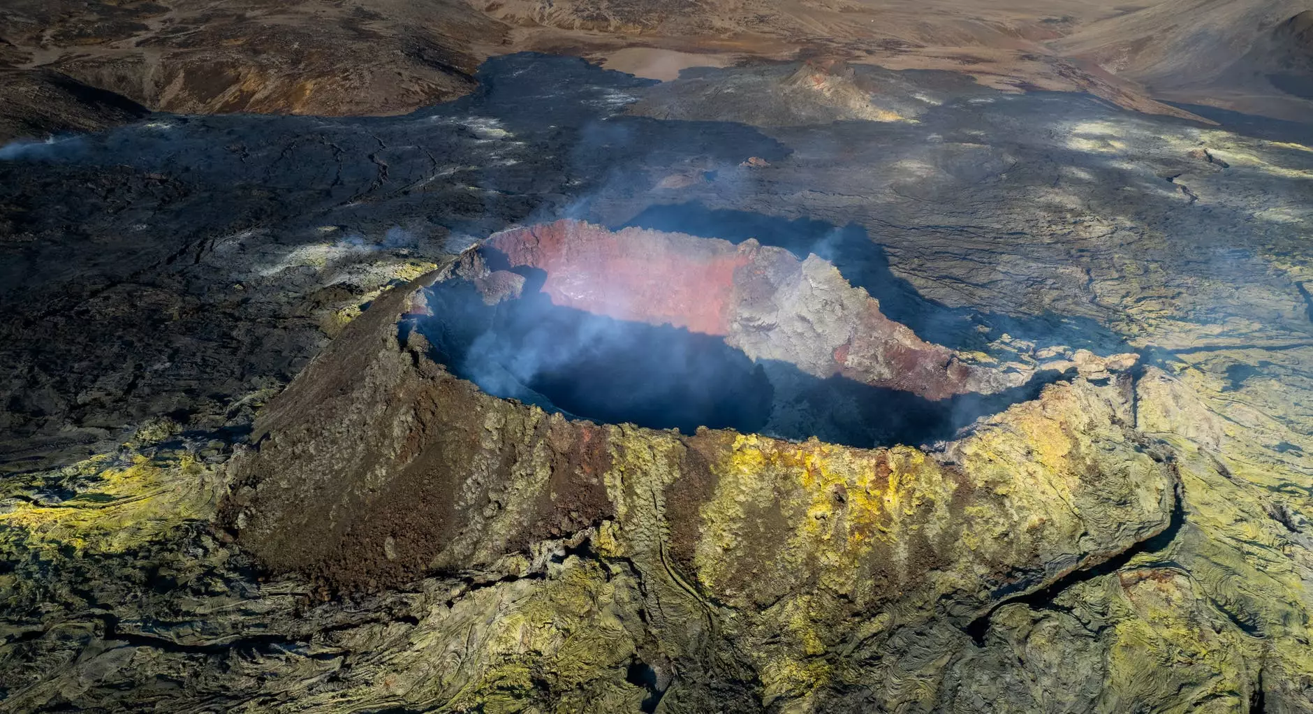 an aerial shot of a volcano iceland